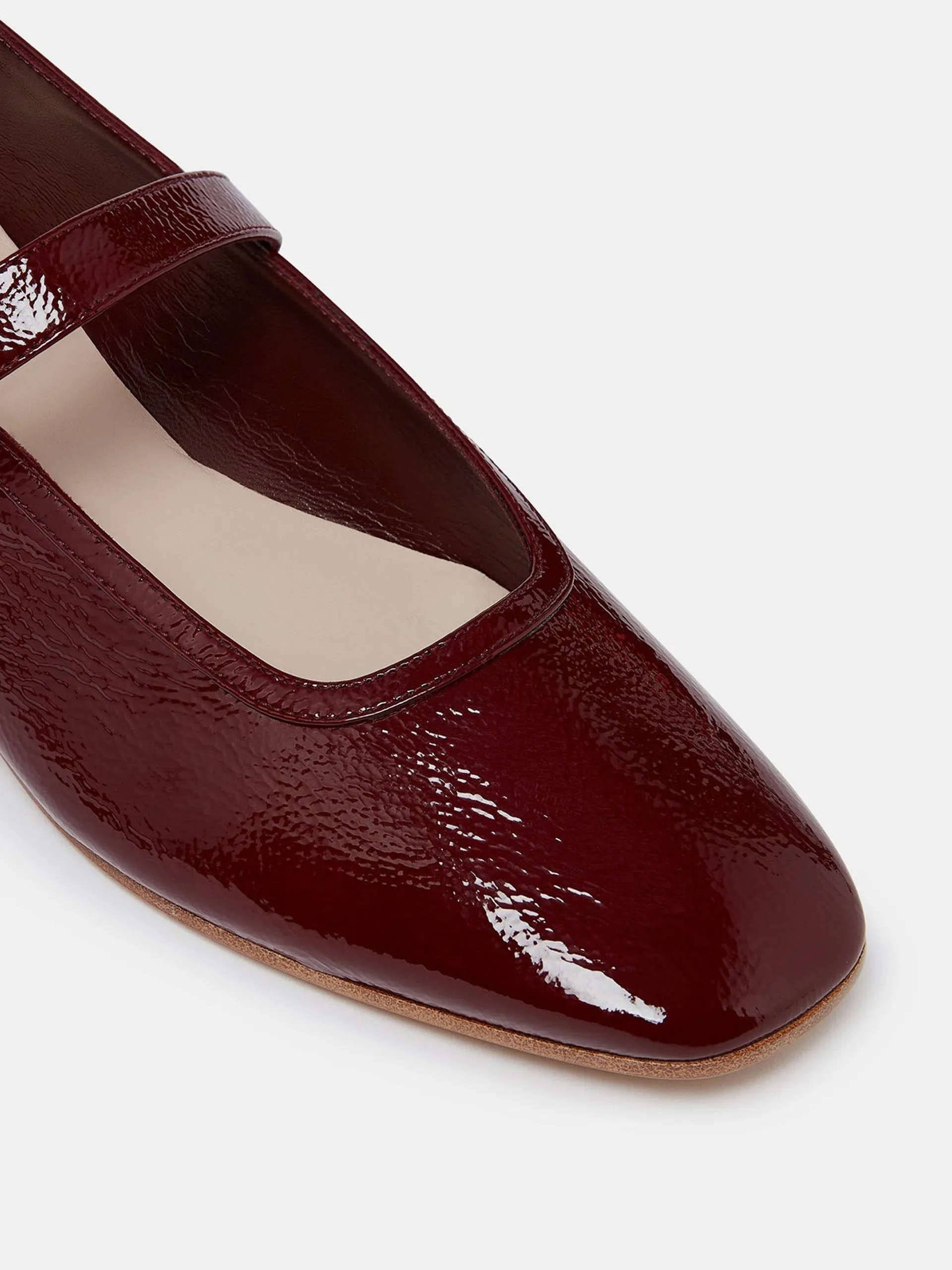 Oxblood patent leather Mary Jane ballet flats